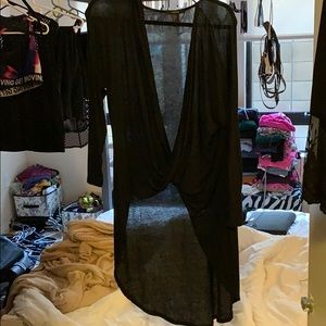 Long sleeve high to low twist front top